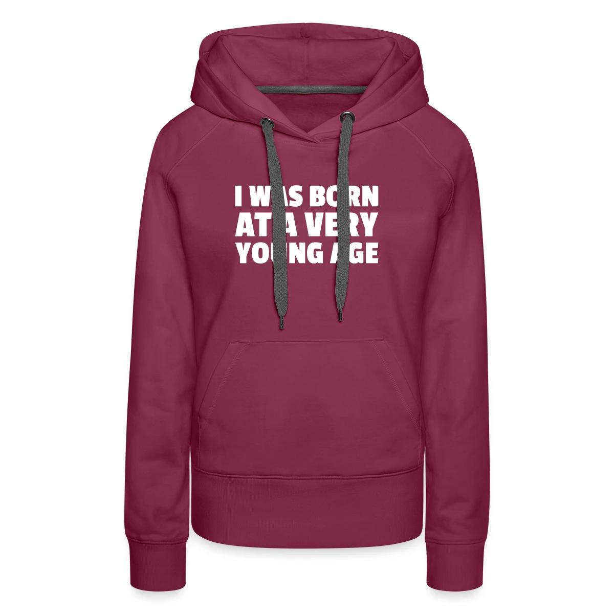 I was born at a very young age - Women's premium hoodies