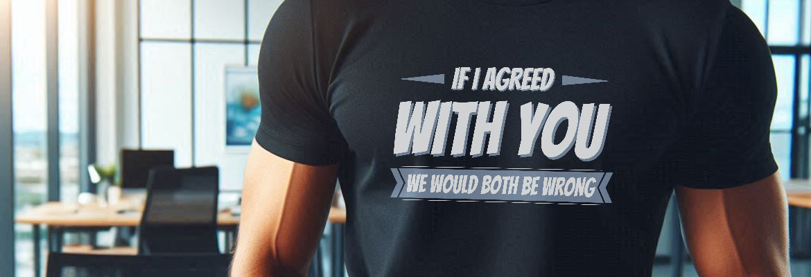 Close-up of a man in an office wearing a funny work humor T-shirt